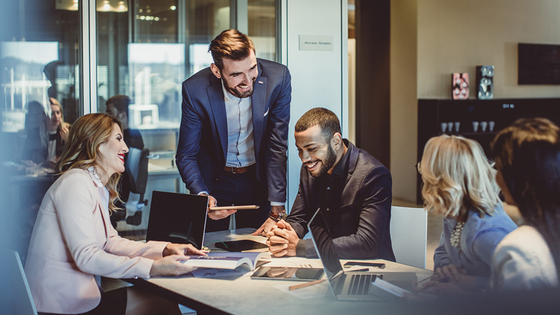 Thumbnail for Leadership Program showing a photo of a leadership team meeting
